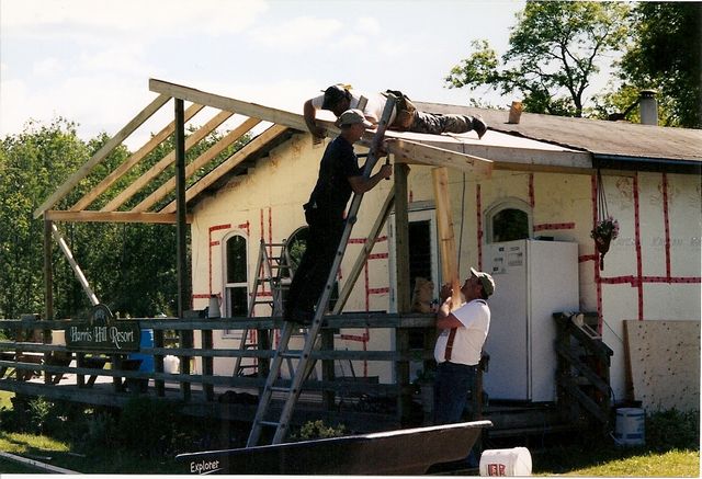 HHR gets new Porch Roof over deck: built by Perry C & Bill H & John L.