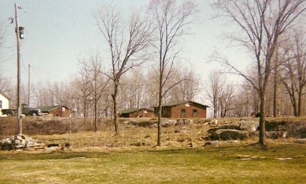 Cabins 1, 2, 3, & 4 on top of the hill towards Lake of the Woods.  View from the lodge: Cabins 1, 2 & 3 Emmitt built.  Cabin 4 was moved in.